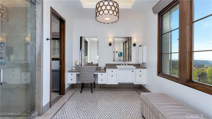 The spa-like master bath features a steam shower, rain shower and dual vanities. It's a perfect relaxation retreat.