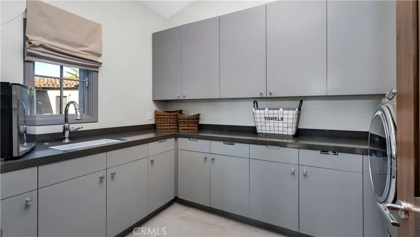 With a laundry room like this, you almost don't mind doing the laundry...almost