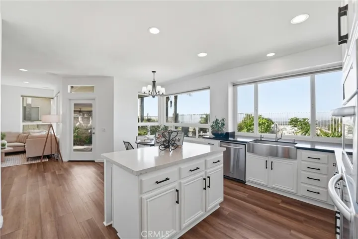 Freshly Remodeled Kitchen With Center Island and Dining Nook