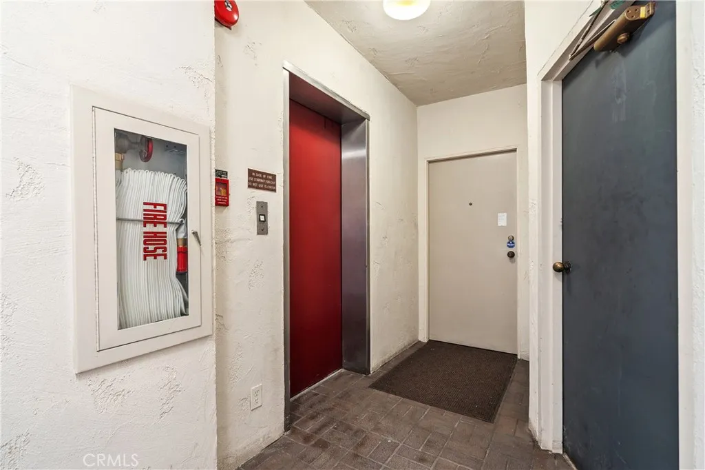 Semi private elevator access opens to a landing shared with only one neighboring residence.