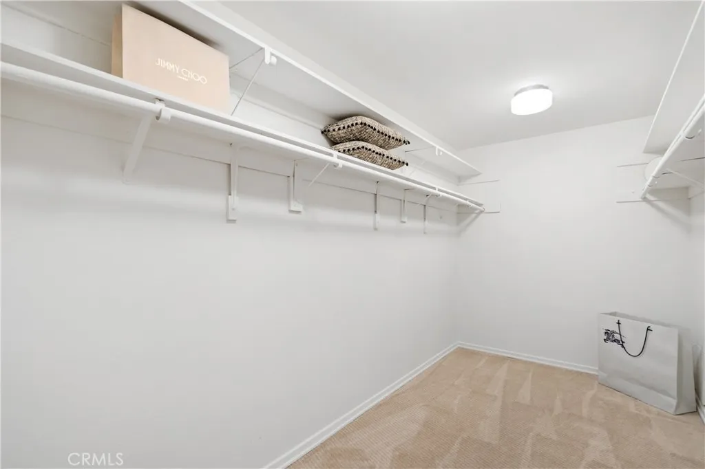Primary suite includes a large walk-in closet plus an additional closet