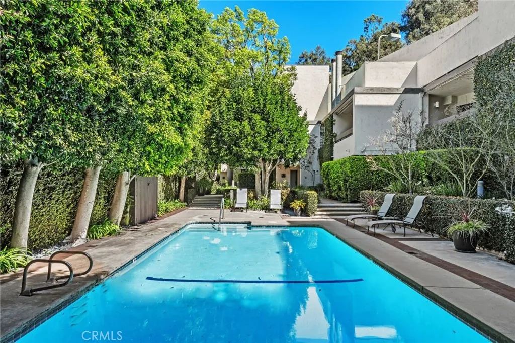Tree-lined pool for privacy