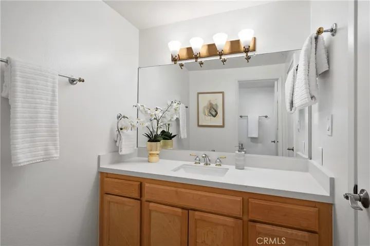 Second bedroom suite bathroom with separate shower area, and private water closet.