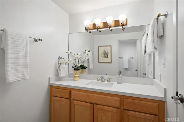 Second bedroom suite bathroom with separate shower area, and private water closet.