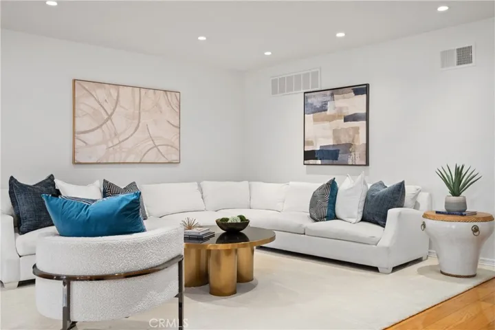Spacious great room for entertaining or possible 3rd bedroom renovation.
