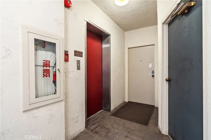 Semi private elevator access opens to a landing shared with only one neighboring residence.