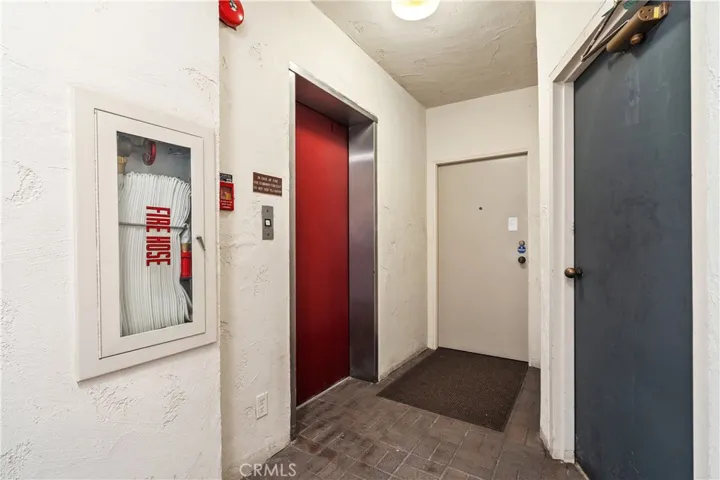 Semi private elevator access opens to a landing shared with only one neighboring residence.