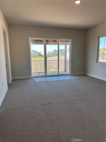 Primary Bedroom with Balcony