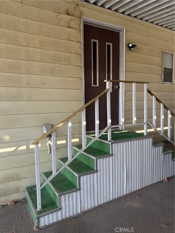 rear stairs in carport