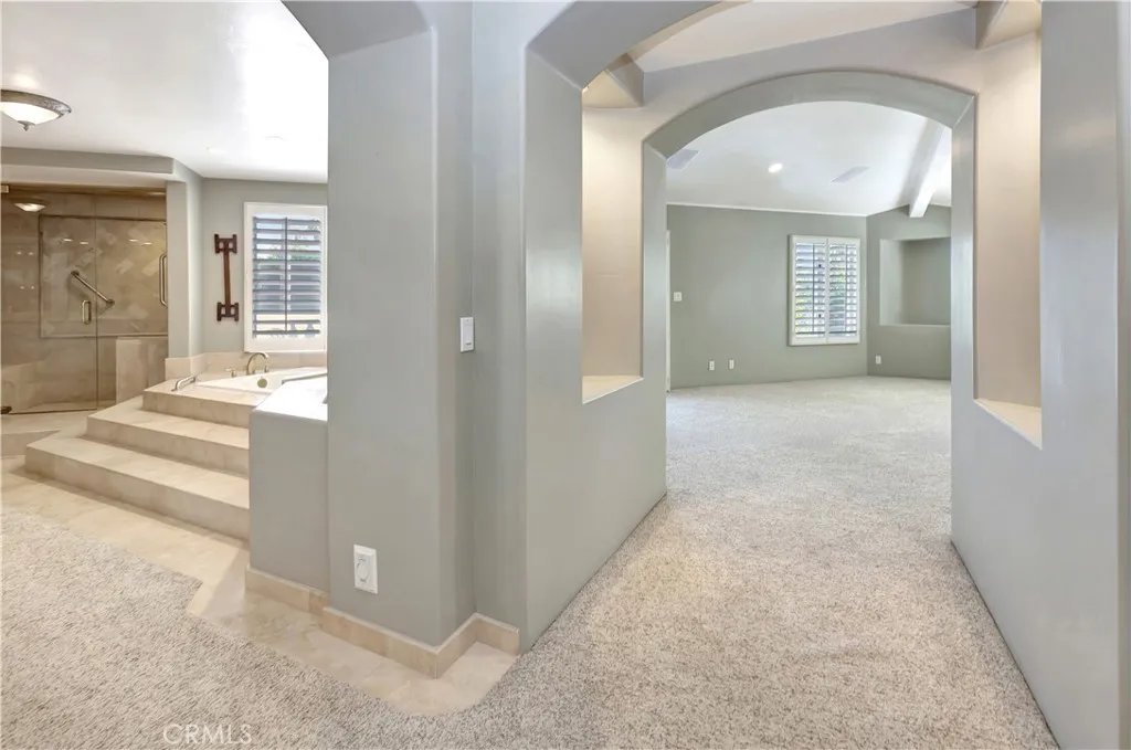 Primary Suite; bath left, bdrm right
