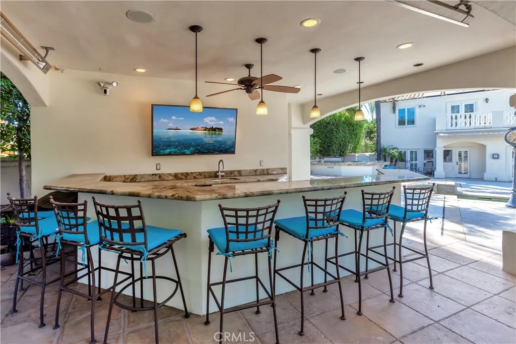 Plenty of seating at the pool house bar!