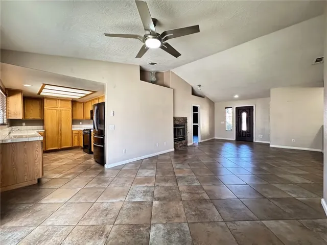 Spacious Dining and Living Room area with fireplace