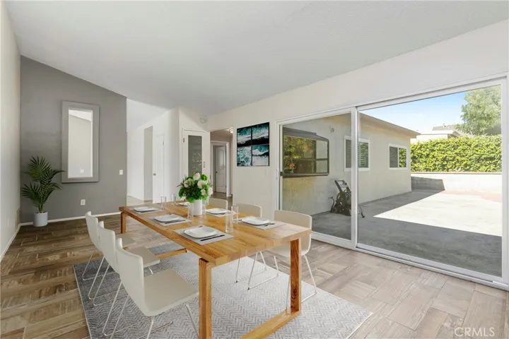 Virtually staged dining area/family room