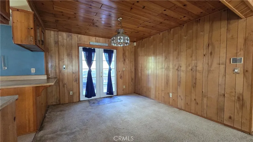 Dining area with access to rear porch