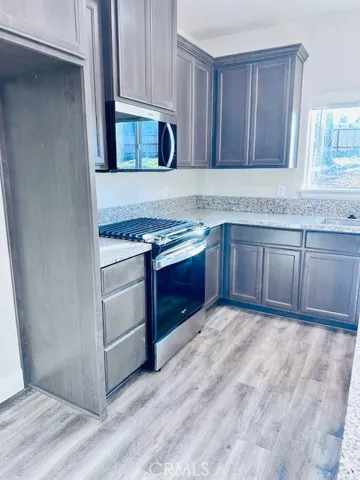 MODEL PHOTOS - Countertops are Marble and flooring is a different shade