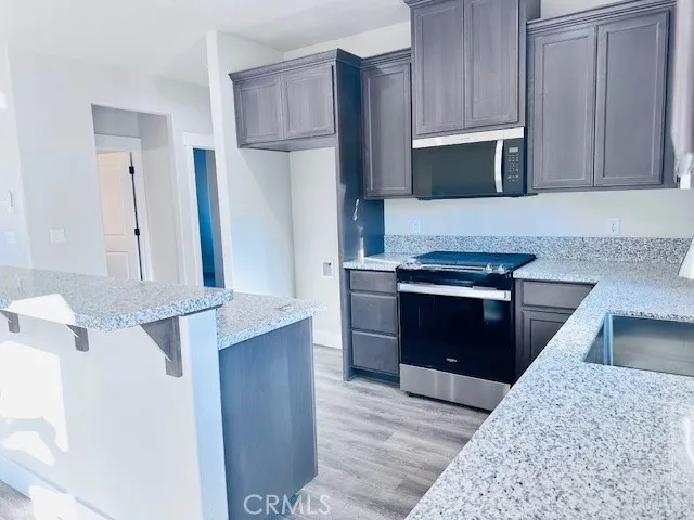 MODEL PHOTOS - Countertops are Marble and flooring is a different shade