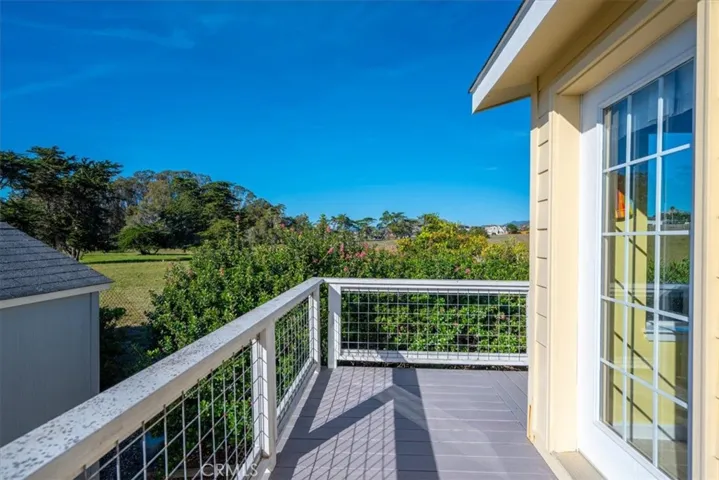 Deck off kitchen nook with views to open space