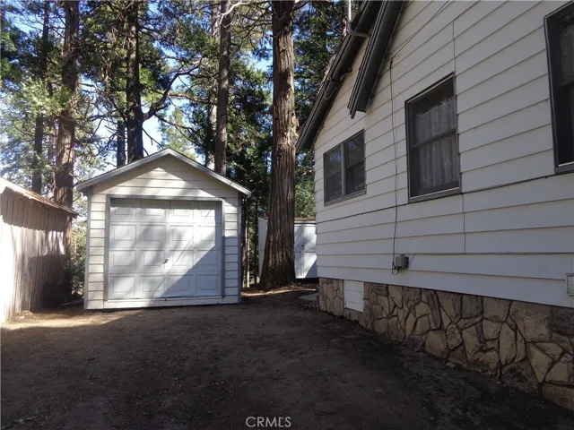 Storage shed at top of driveway