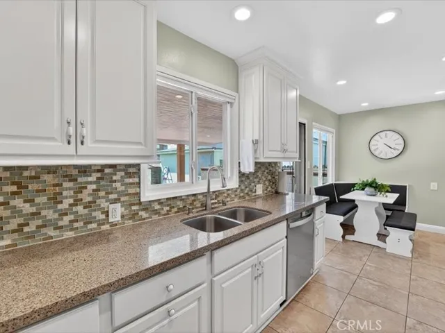 Granite countertops and nice backsplash