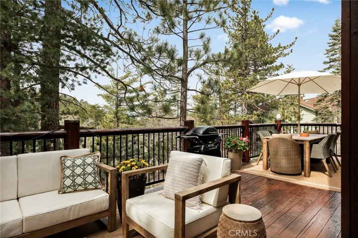 Outdoor living space overlooking property.