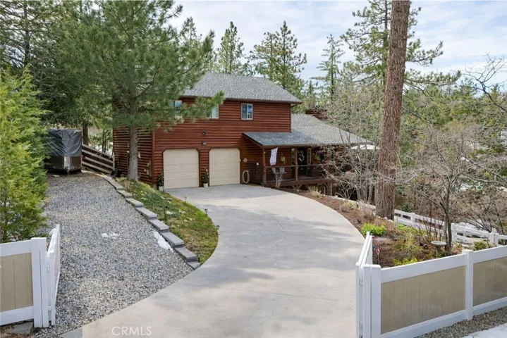 driveway into home - fully fenced and gated