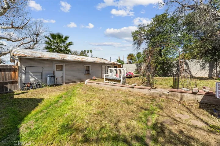 Storage area detached from the house but connected to the garage