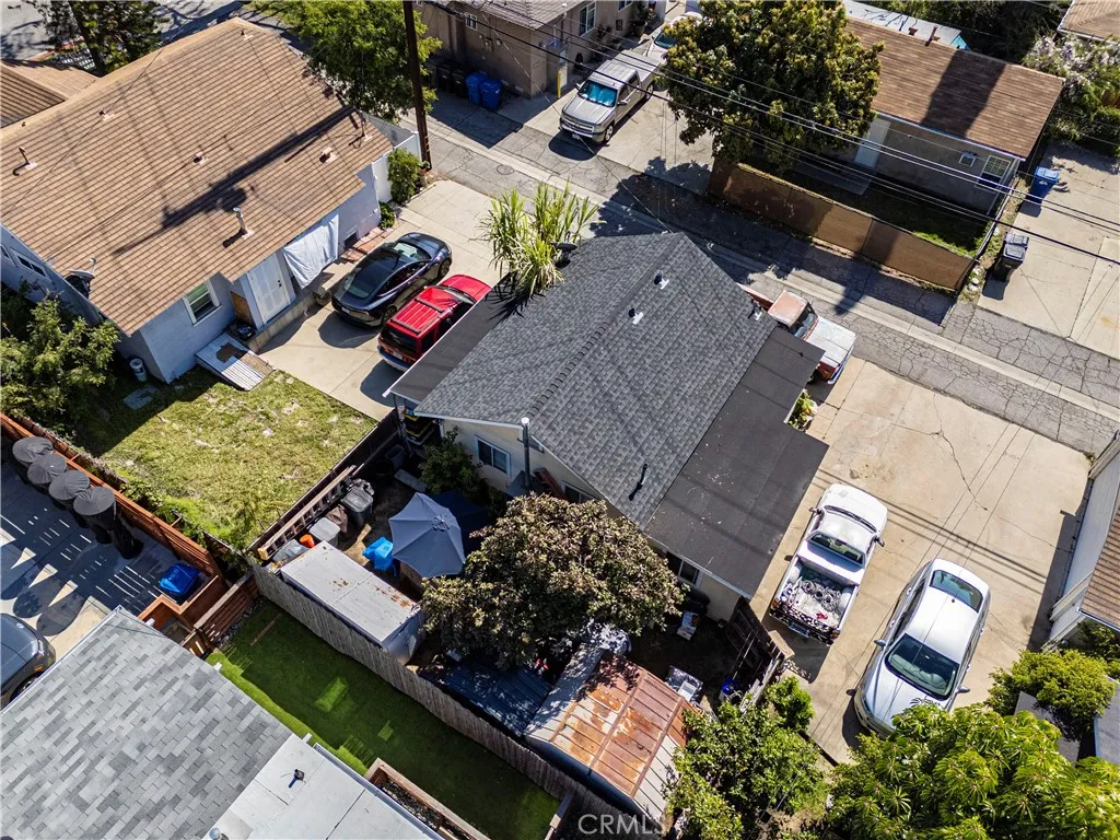Drone view showing Unit #1 (brown roof) & Unit#2 (grey roof).