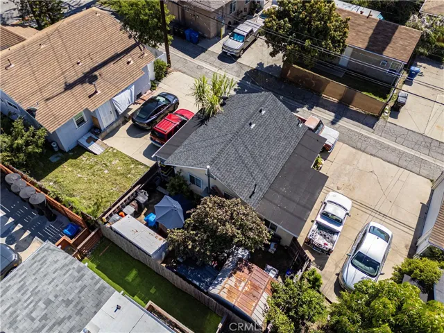 Drone view showing Unit #1 (brown roof) & Unit#2 (grey roof).