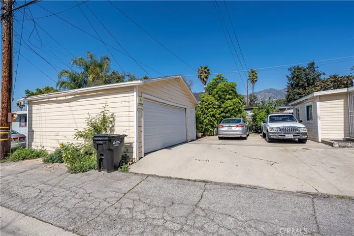 Unit #3 next to 2 car garage with 2 parking spaces.
