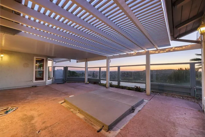 Private patio with hot tub.