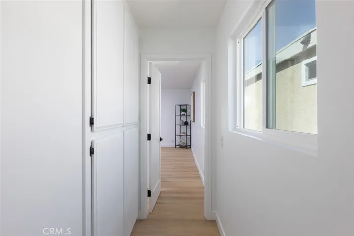 Hallway to rear primary suite