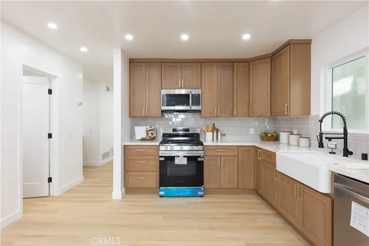 Brand new cabinetry and a farmhouse sink