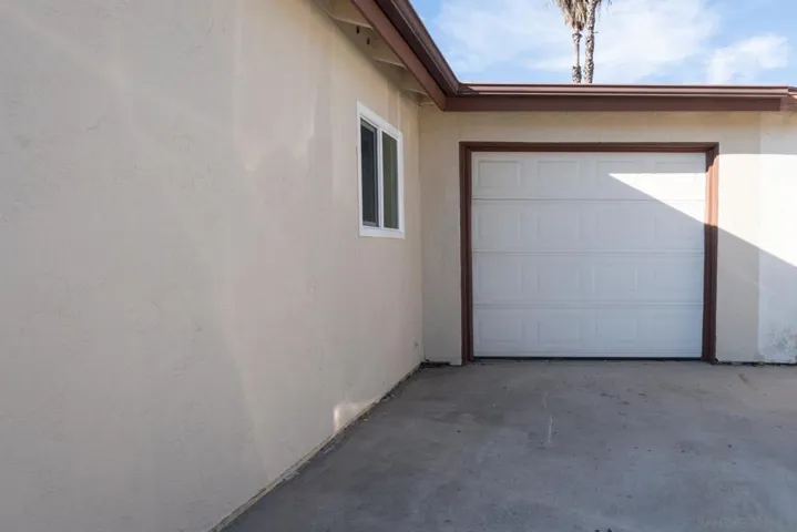 One car garage w/ newer roll up door!