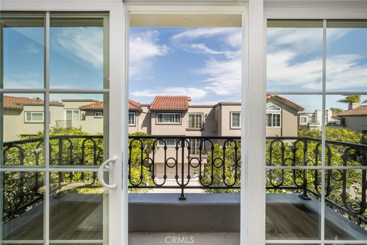 Spacious terrace off the second bedroom adds natural light and cool breezes