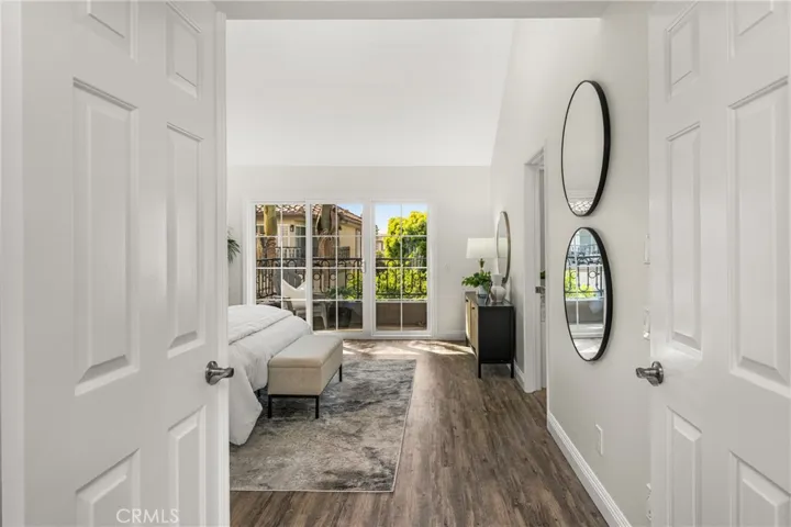 Step into the stunning primary bedroom retreat with cathedral ceilings