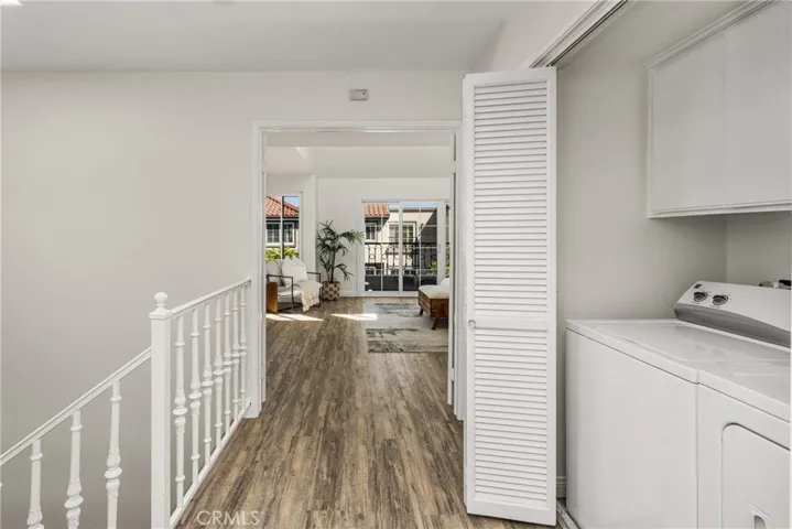 Conveniently located upstairs, the washer and dryer are perfectly positioned between both primary suites