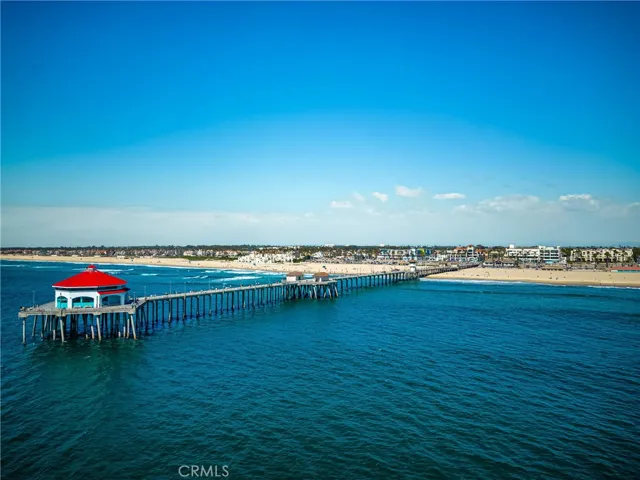 The iconic Huntington Beach Pier is nearby, perfect for a relaxing walk
