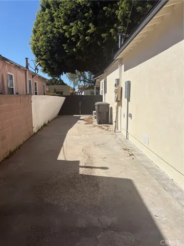 SIDE VIEW OF LONG DRIVEWAY