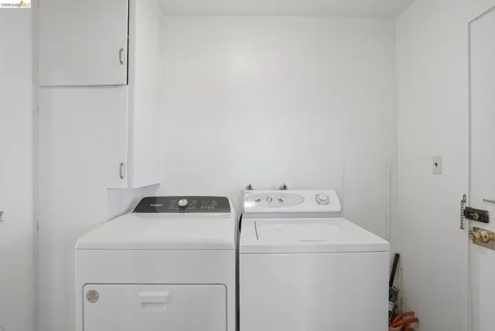 Laundry room featuring washer and dryer