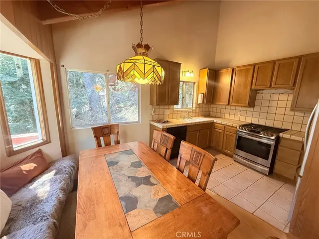 Eating Area with window seat into kitchen