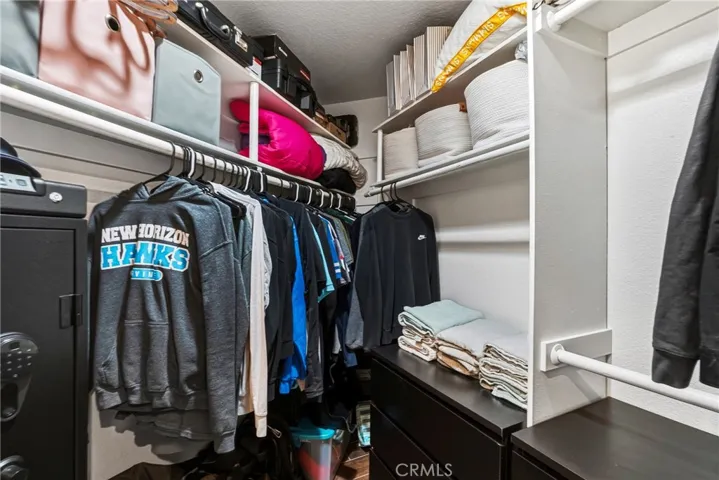 Extra large walk-in closet with extra storage.