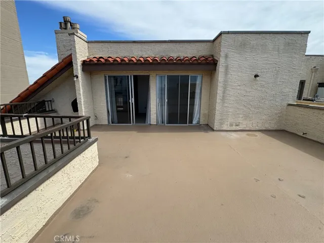 Outdoor Rooftop Deck facing Primary Bedroom