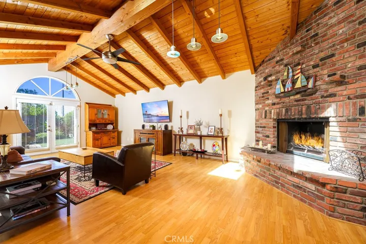 Raised Hearth Fireplace, wood slat and beamed ceiling!