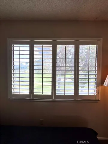 BEDROOM WOOD SHUTTER VIEW
