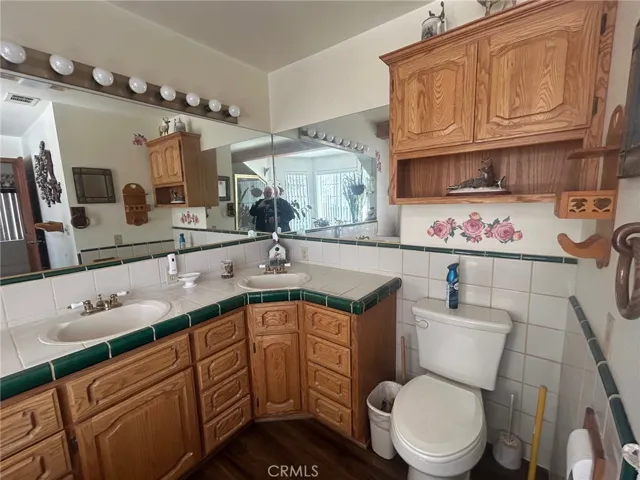 One of the three bathrooms convenient for family or guests