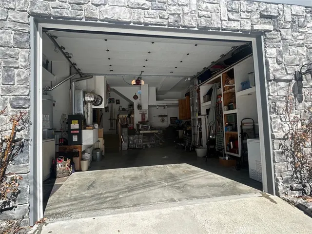 Absolutely awesome garage and the high door could come in handy if you invite Gulliver on his travels.