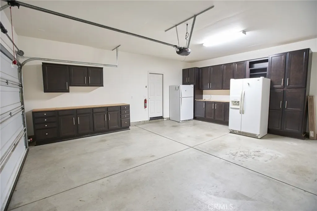GARAGE WITH CABINETS/STORAGE