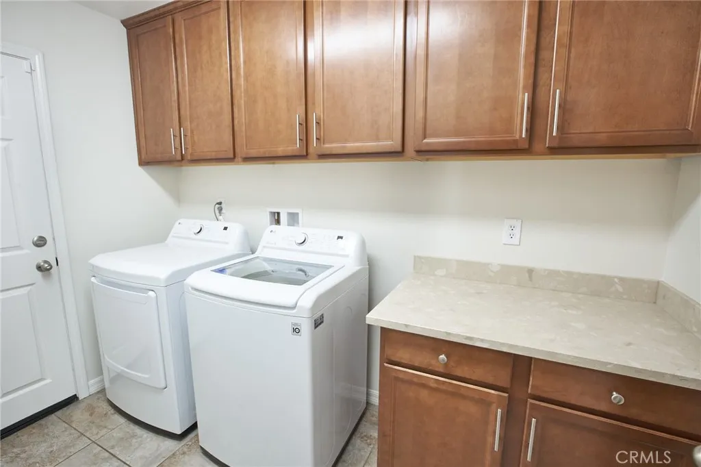 NICELY APPOINTED LAUNDRY ROOM