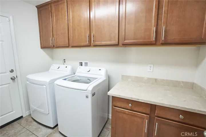 NICELY APPOINTED LAUNDRY ROOM