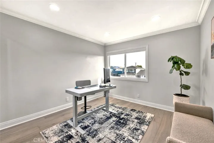 Bright and versatile room ideal for a home office, guest room, or flex space.
